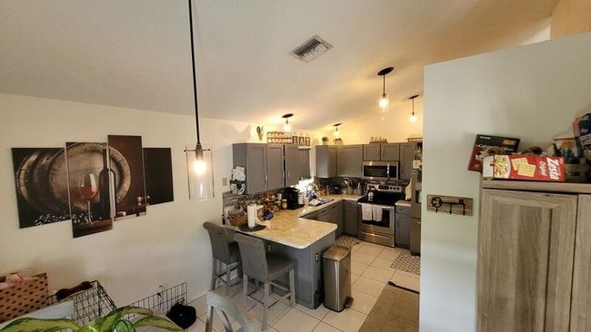1599 Oak Berry Cir, House other with 3 bedrooms, 2 bathrooms and null parking in Wellington FL | Image 19