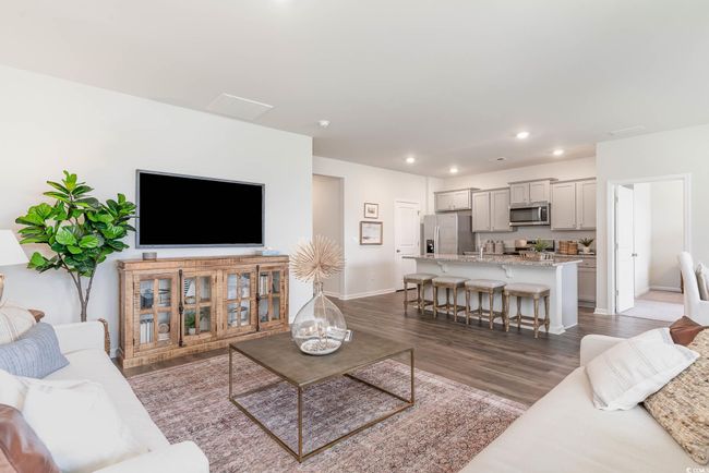 Living room featuring dark hardwood / wood-style flooring | Image 11