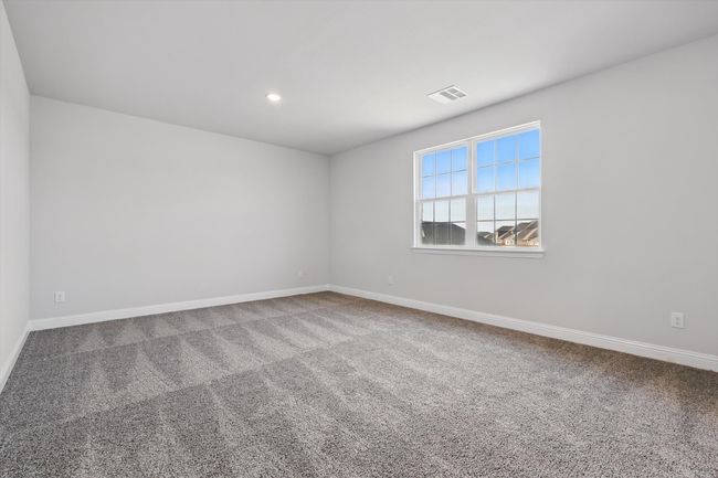 Carpeted spare room with baseboards, visible vents, and recessed lighting | Image 14