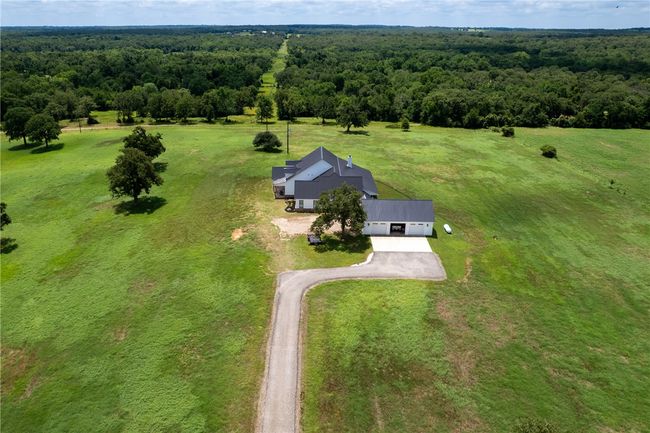 View from above of property with a forest | Image 32