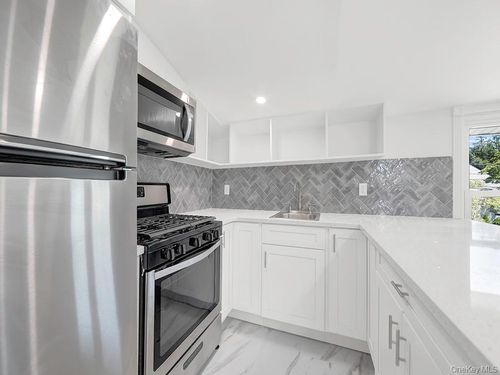 2-8 Winthrop St, Lynbrook, NY, 11563-1020 | Card Image