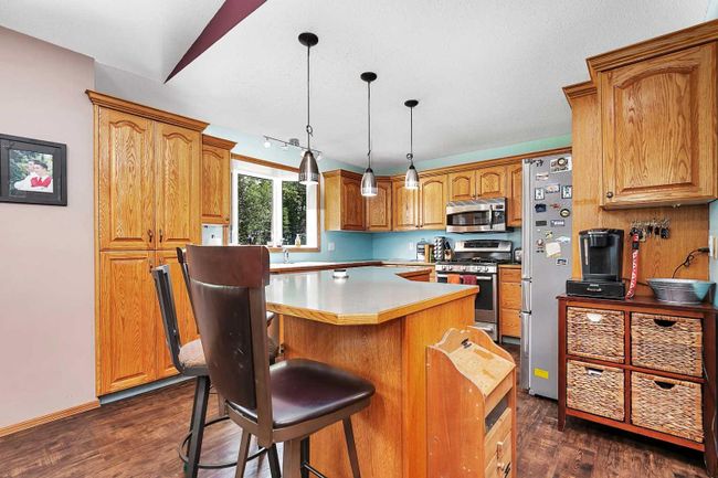 361052 Range Road 5 1, Home with 5 bedrooms, 3 bathrooms and 2 parking in Caroline AB | Image 9