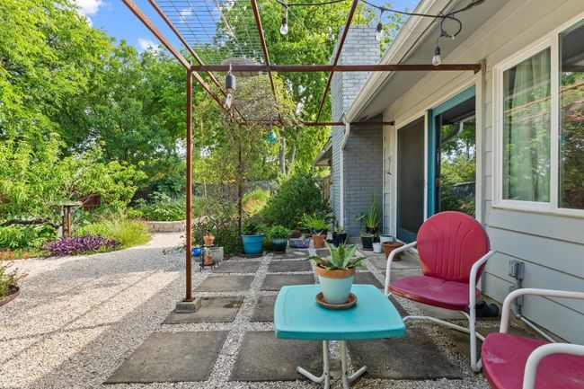 Imagine unwinding at the end of a long day on your back porch with your favorite ice cold beverage and taking in the serene views of your natural backyard retreat. | Image 14