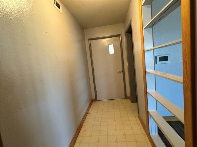 Doorway featuring light tile floors | Image 24