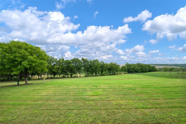 View of yard featuring a view of rural / pastoral area | Image 32