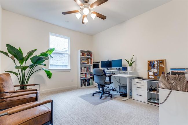 Office area separate from bedrooms and living/dining | Image 14