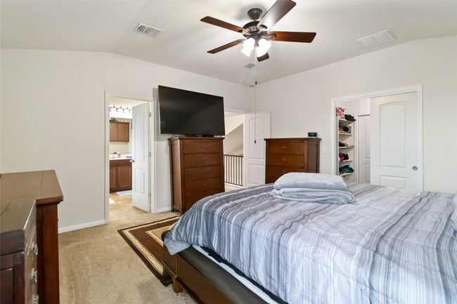 Master Bedroom with a walk in closet, , and ensuite bathroom. | Image 12