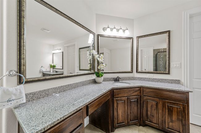 Bathroom with vanity and tile patterned floors | Image 25