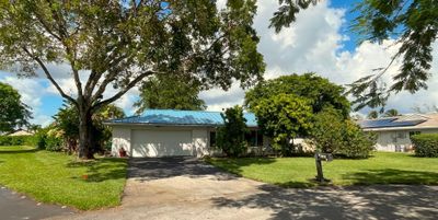 9107 Nw 72nd Ct, House other with 4 bedrooms, 2 bathrooms and null parking in Tamarac FL | Image 2