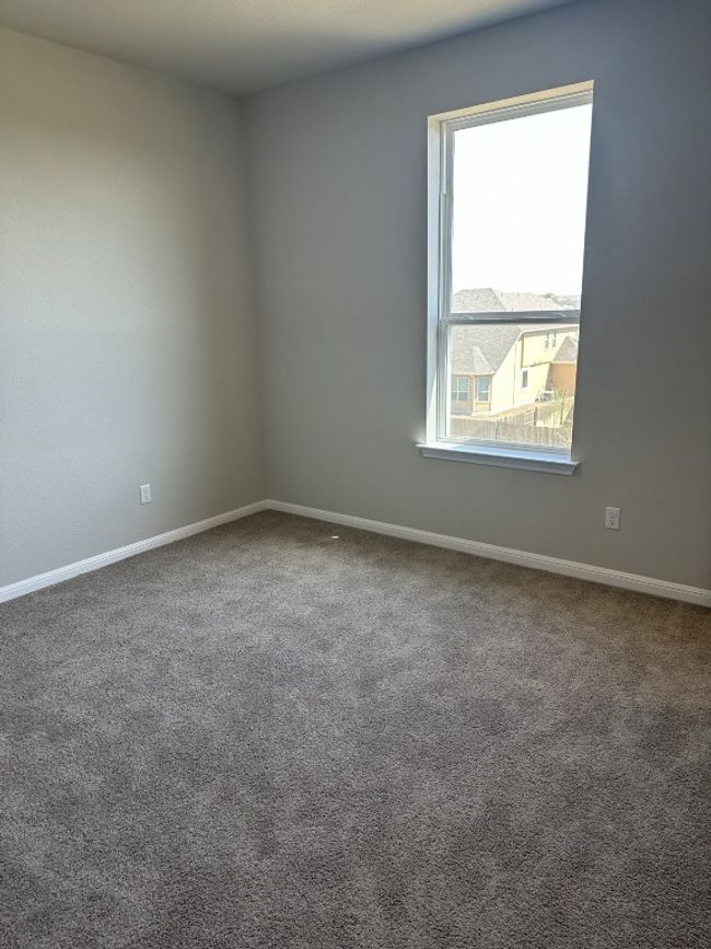 Spare room with baseboards and carpet floors | Image 5