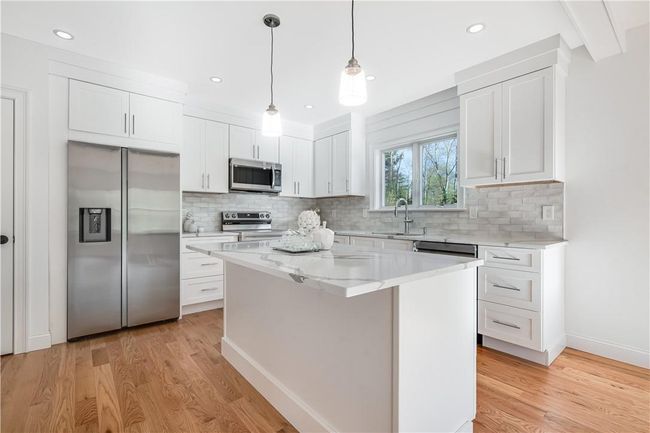 Unit #2: Right side, brand new kitchen. It has 2 pantry's and access to your 1 car garage. | Image 22