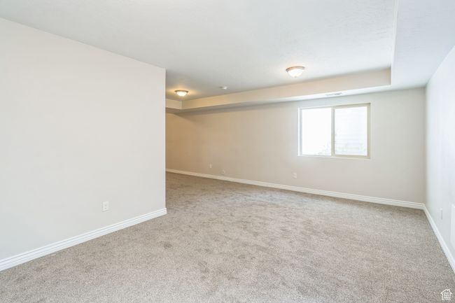 Carpeted empty room with baseboards | Image 27