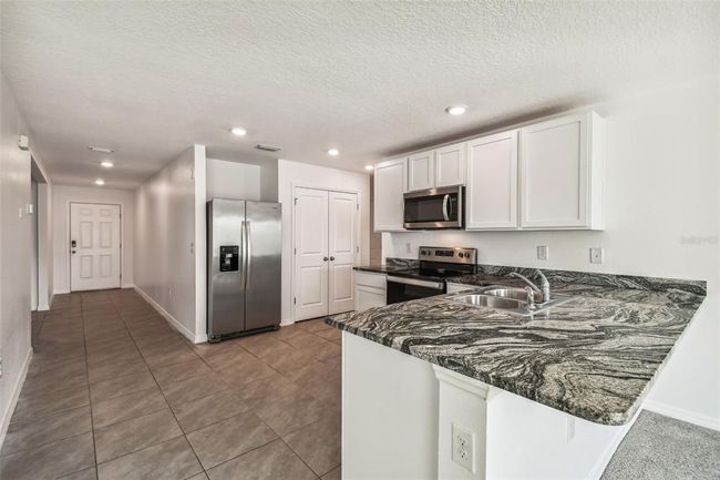 8027 Broad Pointe Dr, House other with 3 bedrooms, 2 bathrooms and null parking in Zephyrhills FL | Image 13