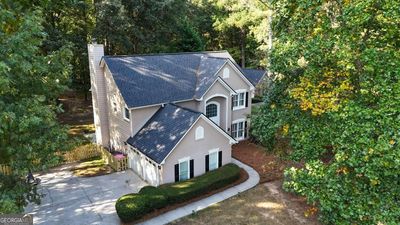 6815 Fairgreen Drive, House other with 4 bedrooms, 2 bathrooms and 2 parking in Suwanee GA | Image 1