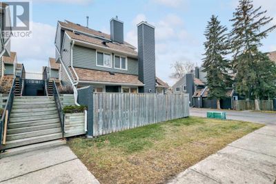 54 Glamis Green Sw, Townhouse with 4 bedrooms, 2 bathrooms and 1 parking in Calgary AB | Image 1