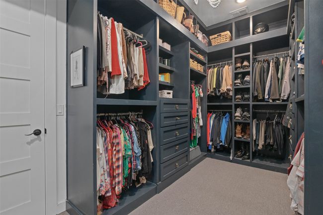 Primary closet with access to the laundry room | Image 20