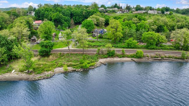 Drone / aerial view of a nearby body of water | Image 8