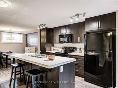 100-517 Mckenzie Towne Close Se, Calgary, AB, T2Z1A8 | Card Image