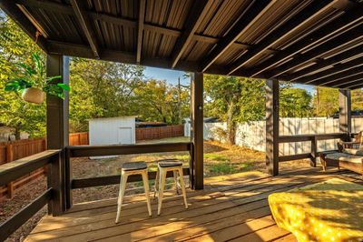 Wooden terrace with a storage unit | Image 2