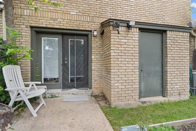 Doorway to property with brick siding | Image 30