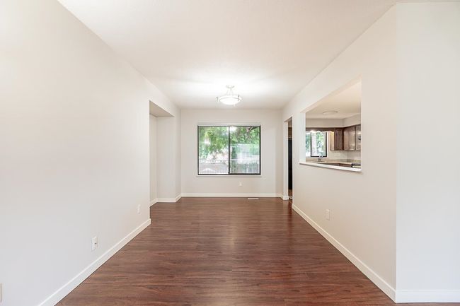 Unfurnished room with dark wood-style floors | Image 6