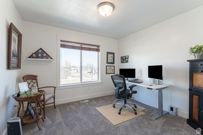 Office space featuring visible vents, baseboards, and carpet flooring | Image 17
