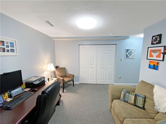 The game room has a spacious storage closet. | Image 22