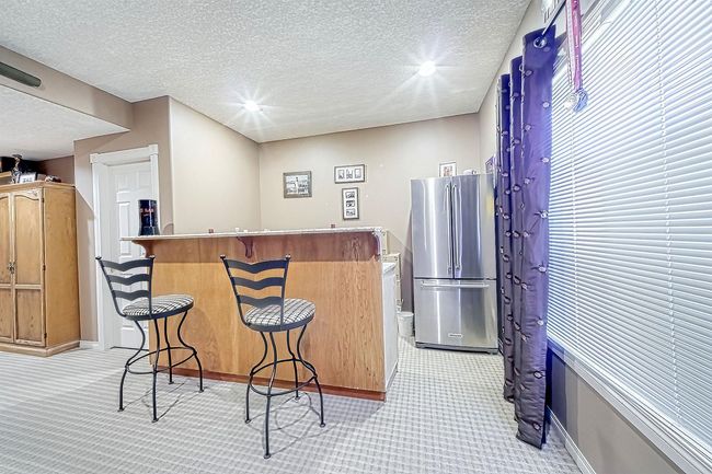 149 Bow Ridge Cres, House detached with 3 bedrooms, 3 bathrooms and 4 parking in Cochrane AB | Image 36