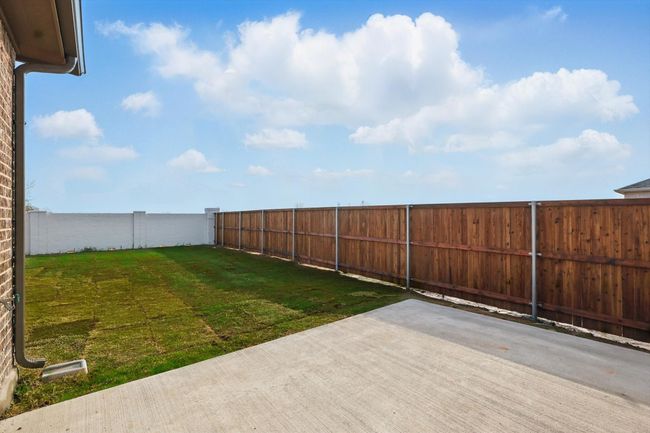View of yard with a fenced backyard and a patio area of 10 X 14 | Image 21