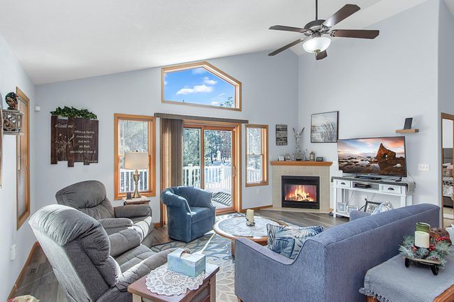 Patio door leads out to large deck! | Image 27