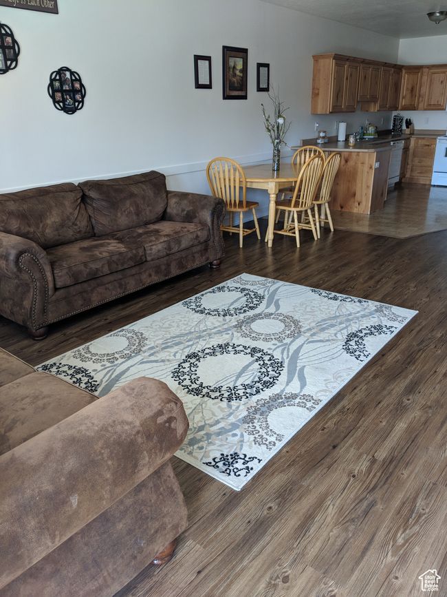 Living room featuring wood finished floors | Image 6