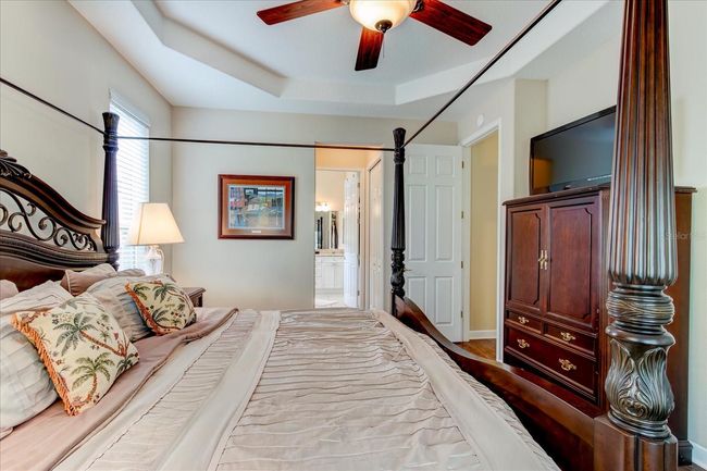 Double walk in closets through hallway to master bath | Image 35