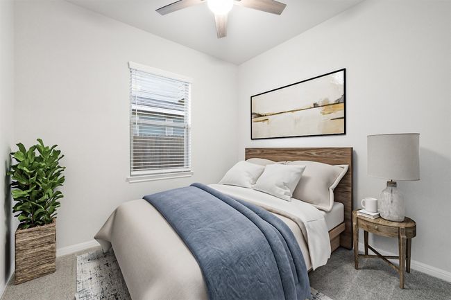 Bedroom with carpet flooring, ceiling fan, and baseboards | Image 20