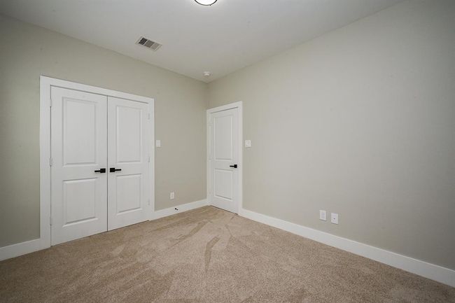 Carpet In All The Bedrooms With Trim Flooring | Image 14