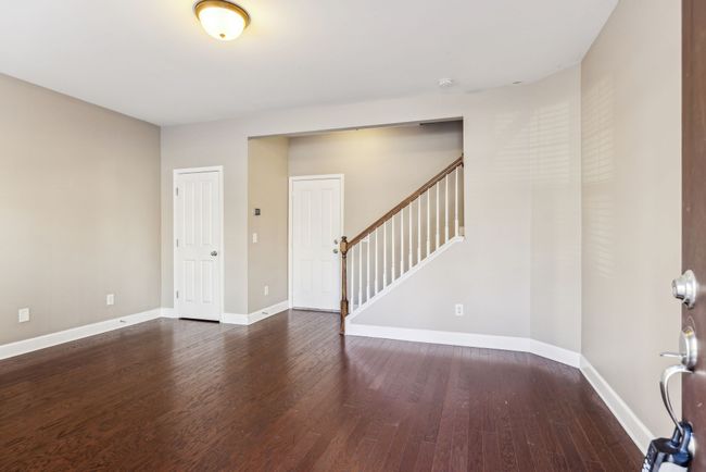 Main level den with beautiful woods | Image 5