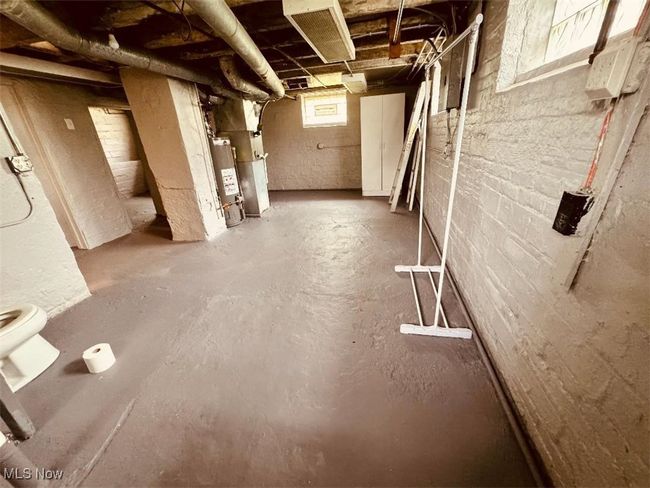 Unfinished basement, freshly painted | Image 18
