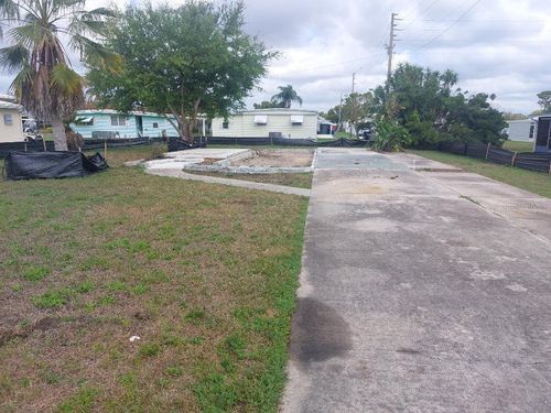 26-105 Lake Tarpon Dr, PALM HARBOR, FL, 34684-1423 | Card Image