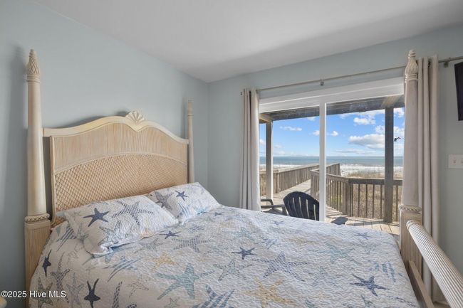 Bedroom 2 | 1st level with access to oceanfront deck | Image 27