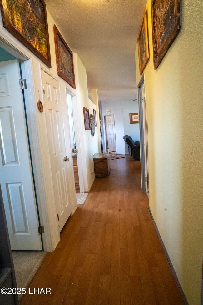 Hallway to living room | Image 29