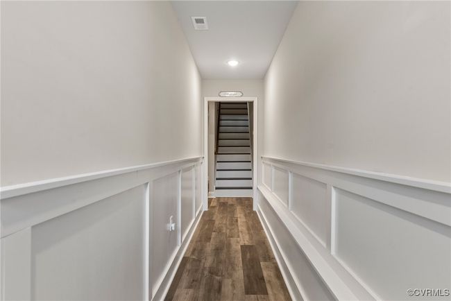 Hallway with dark wood-type flooring | Image 24