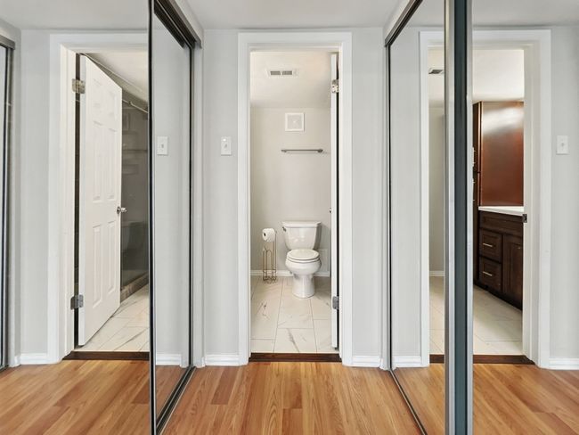 Dual closets with mirrored doors | Image 13