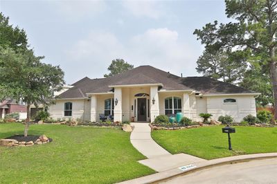 This home offers the convenience of single-story living with the added bonus of a versatile flex space, bedroom, and full bathroom located upstairs. The main floor provides all the essential living areas, while the upper level offers extra space for guests, hobbies, game room. media area or a home office. NEW ROOF 2024! | Image 2