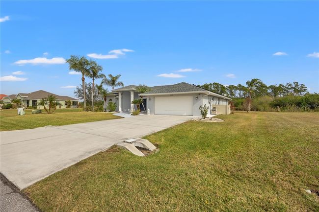 12950 Sw Pembroke Cir S, House other with 3 bedrooms, 2 bathrooms and null parking in LAKE SUZY FL | Image 45