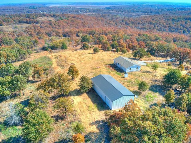 Looking from the W to Lake Keystone showing 10' shop door on North of garage. | Image 11