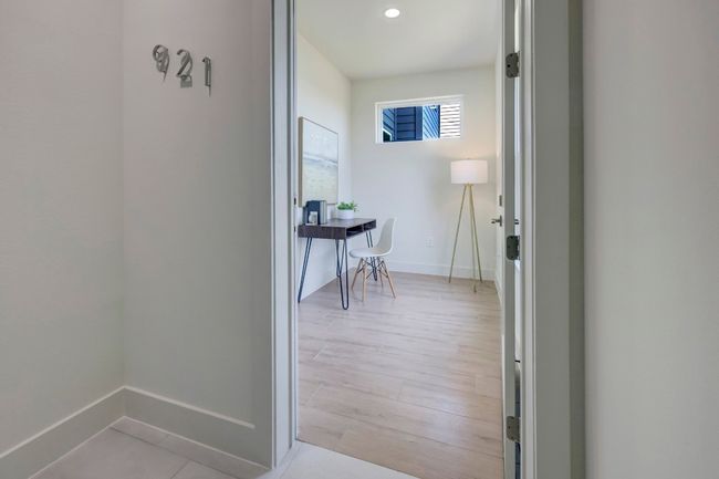 VIEW FROM COMMON AREA STAIRS LOOKING INTO CONDO #921, FLOOR PLAN A. | Image 8