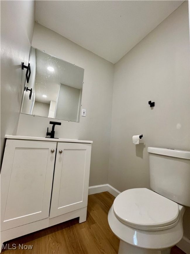 Bathroom featuring wood finished floors and vanity | Image 16