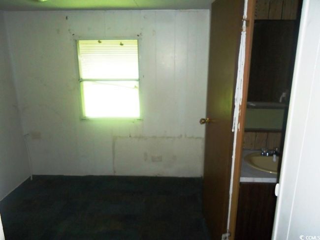Empty room featuring a sink | Image 13
