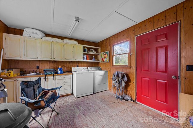 Interior of outbuilding houses laundry | Image 23