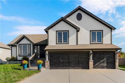 View of front of house with a garage | Image 2