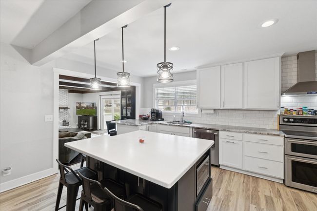New quartz island with seating | Image 16